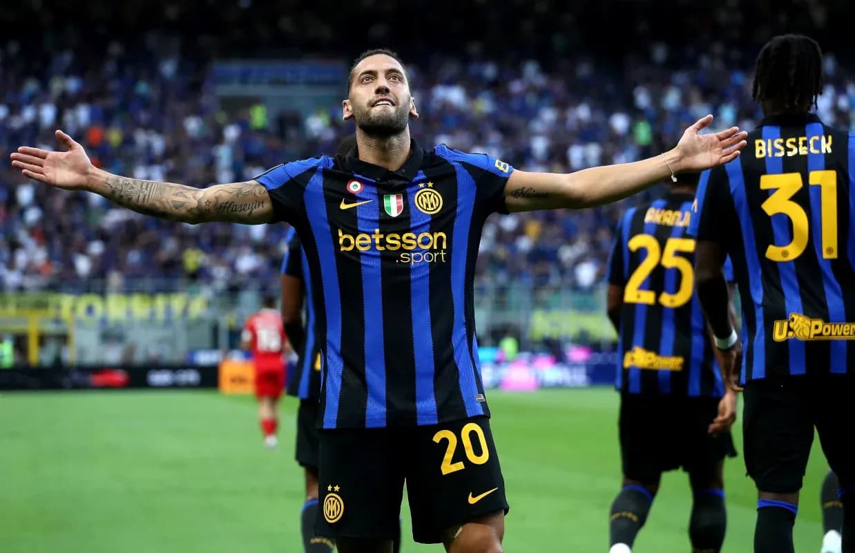 Player celebrating goal with teammates during match Player celebrating goal with teammates during match