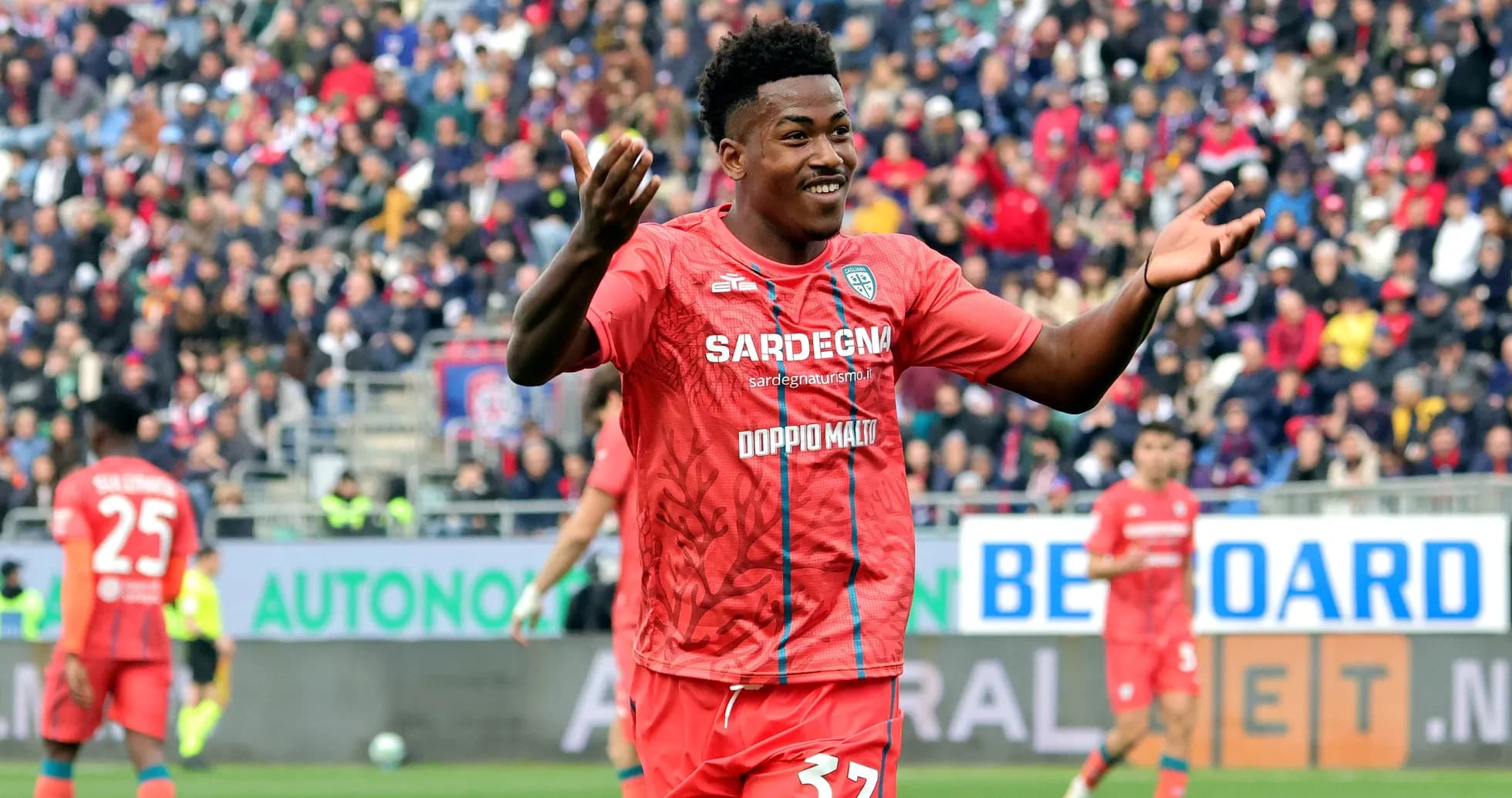 Player celebrating during a football match Player celebrating during a football match