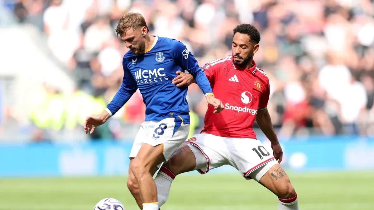 Everton and Manchester United players contesting for the ball Everton and Manchester United players contesting for the ball