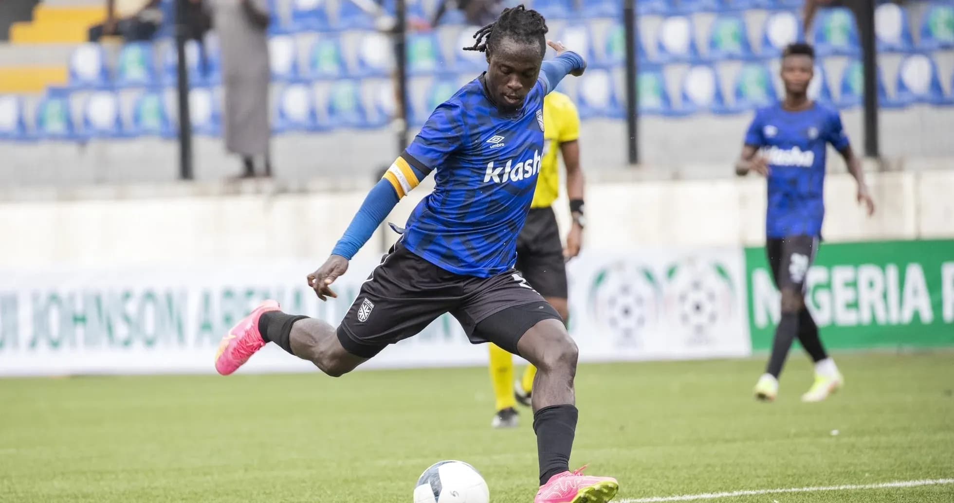 Player kicking ball during NPFL match Player kicking ball during NPFL match