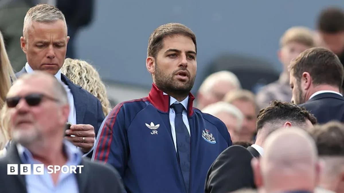 Man in Newcastle jacket among crowd at event Man in Newcastle jacket among crowd at event