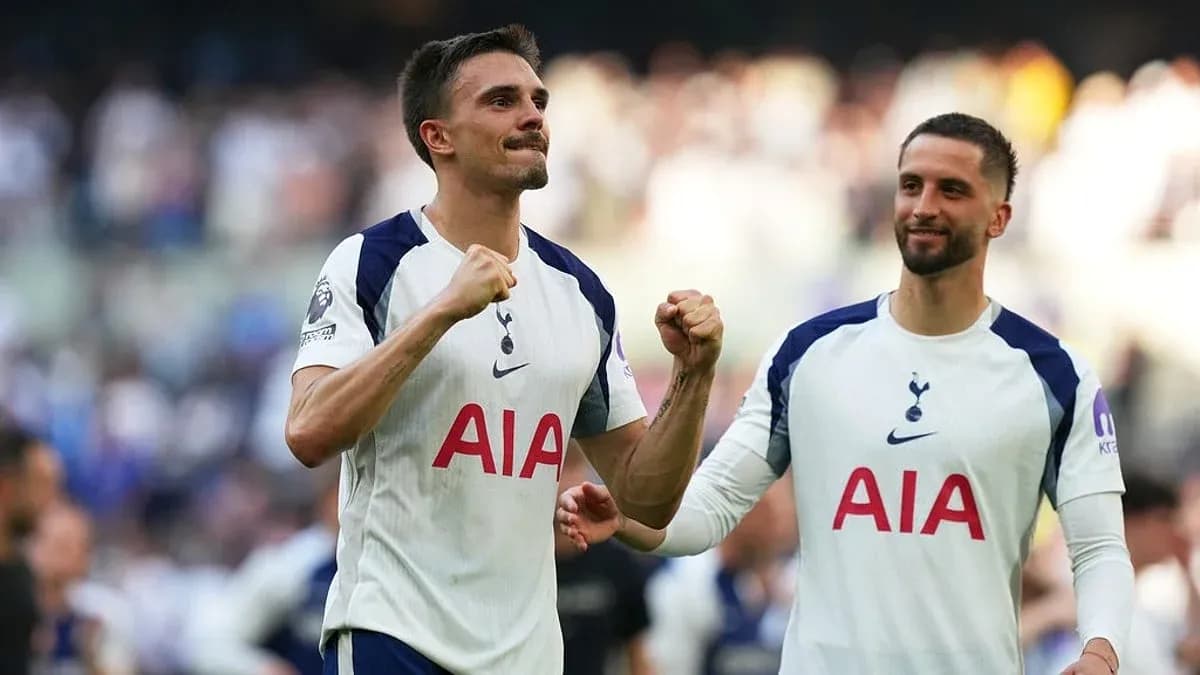 Tottenham players celebrating after a goal Tottenham players celebrating after a goal