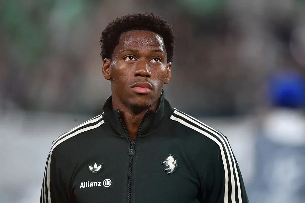 Player in black jacket before a match Player in black jacket before a match