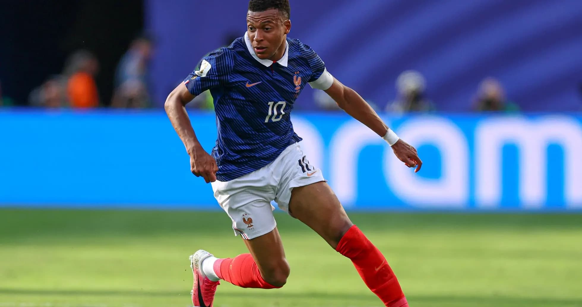Kylian Mbappé dribbling during World Cup match Kylian Mbappé dribbling during World Cup match