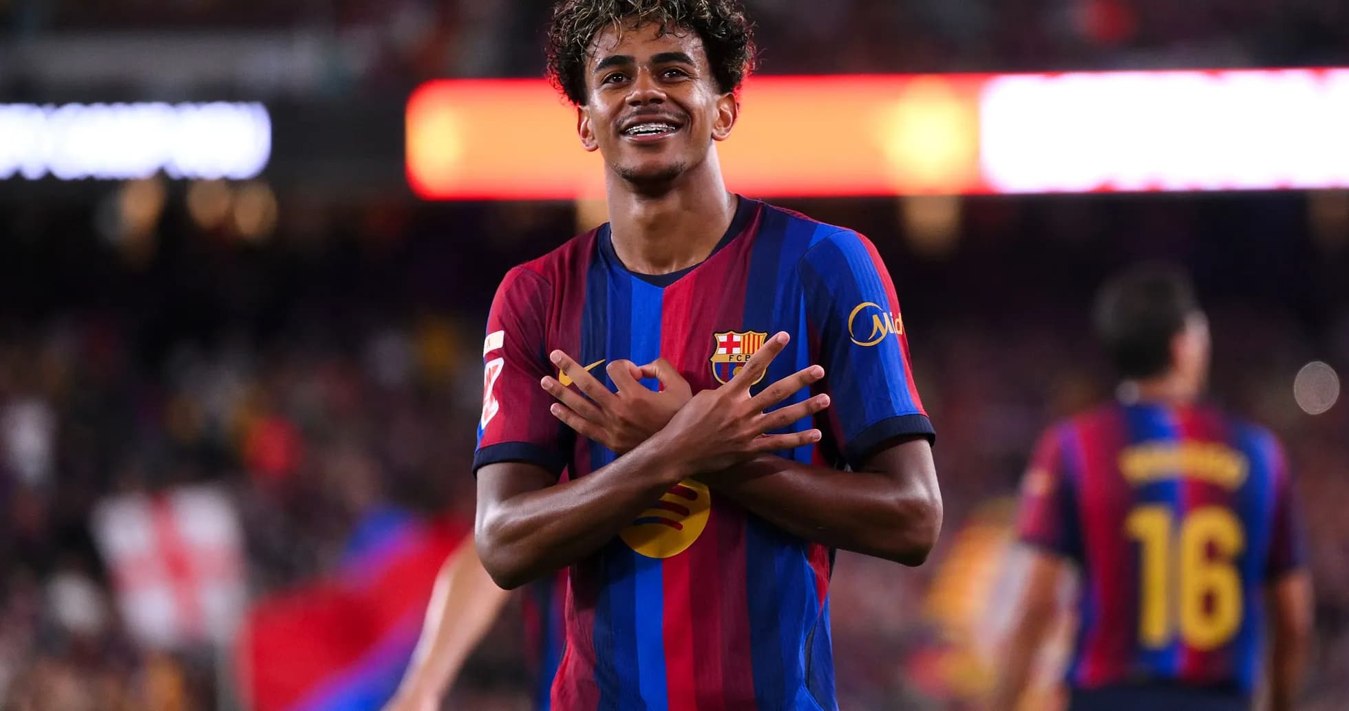 Player celebrating goal with crossed arms gesture Player celebrating goal with crossed arms gesture