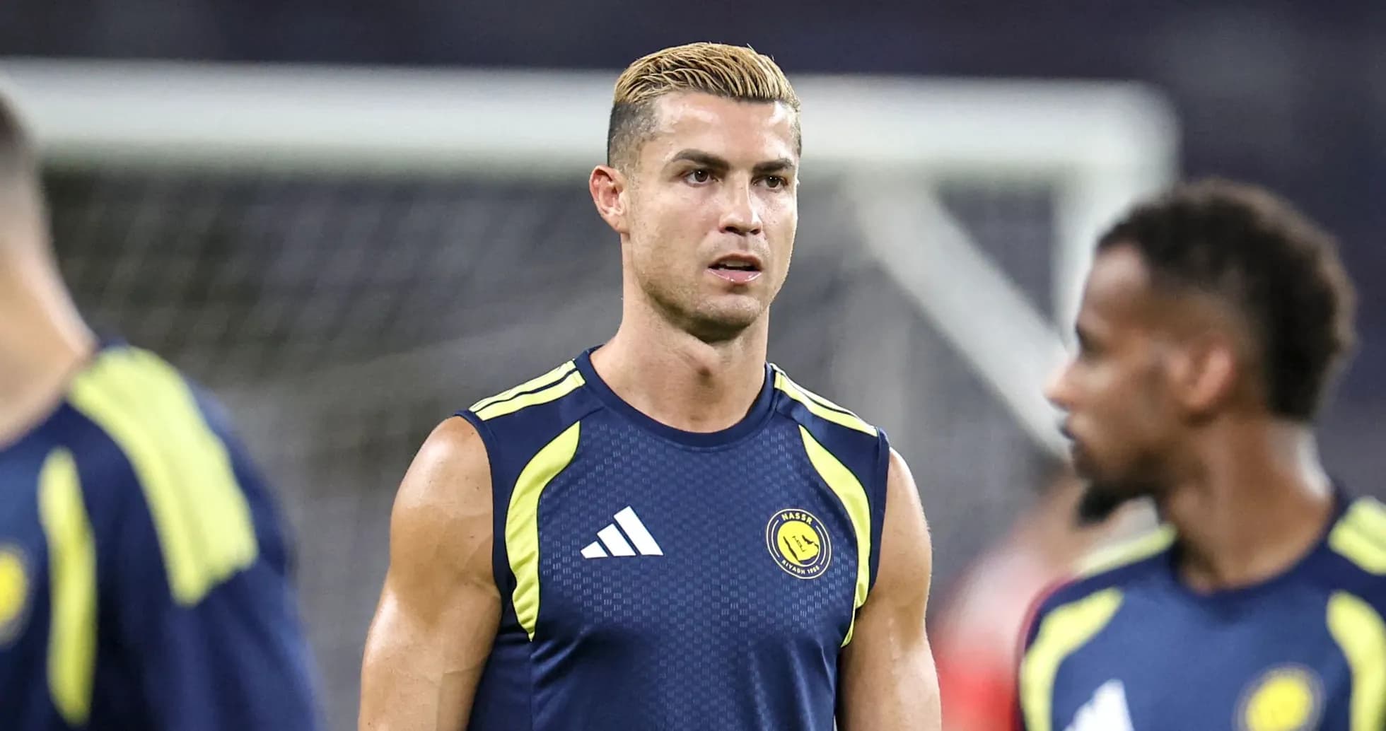 Player training on the pitch before a match Player training on the pitch before a match