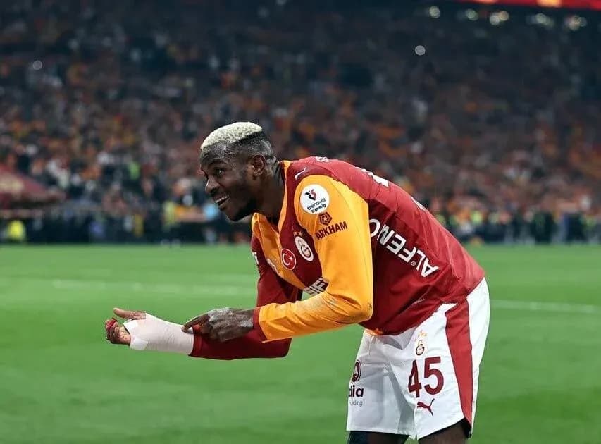Player celebrating on the pitch during match Player celebrating on the pitch during match
