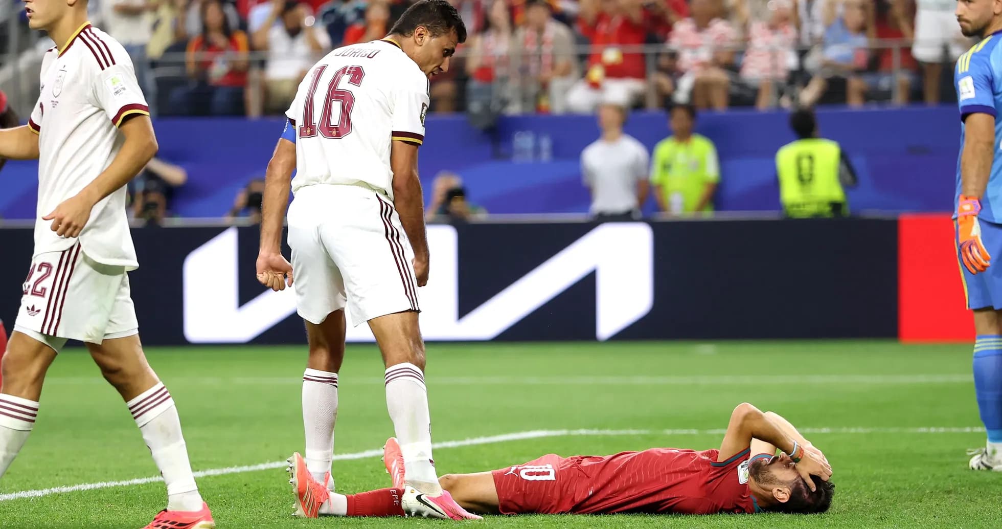 Player lying on the ground during a match Player lying on the ground during a match