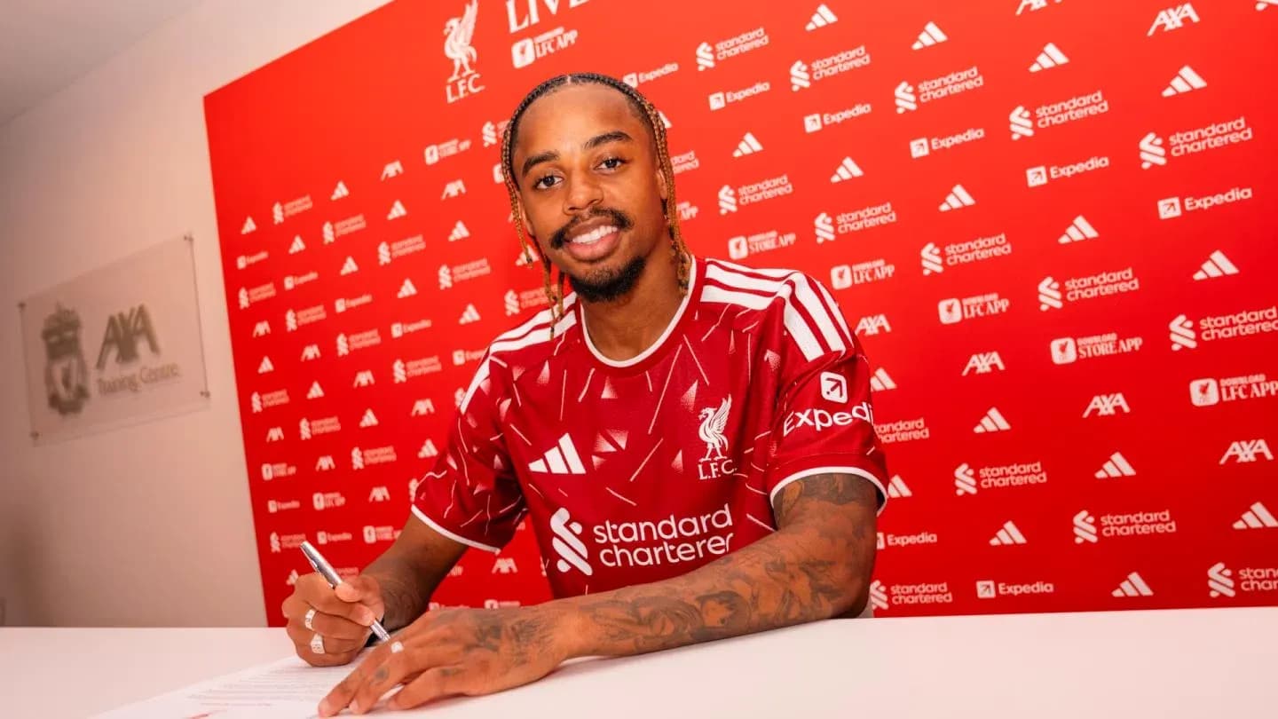 Player signing contract at Liverpool FC press conference Player signing contract at Liverpool FC press conference