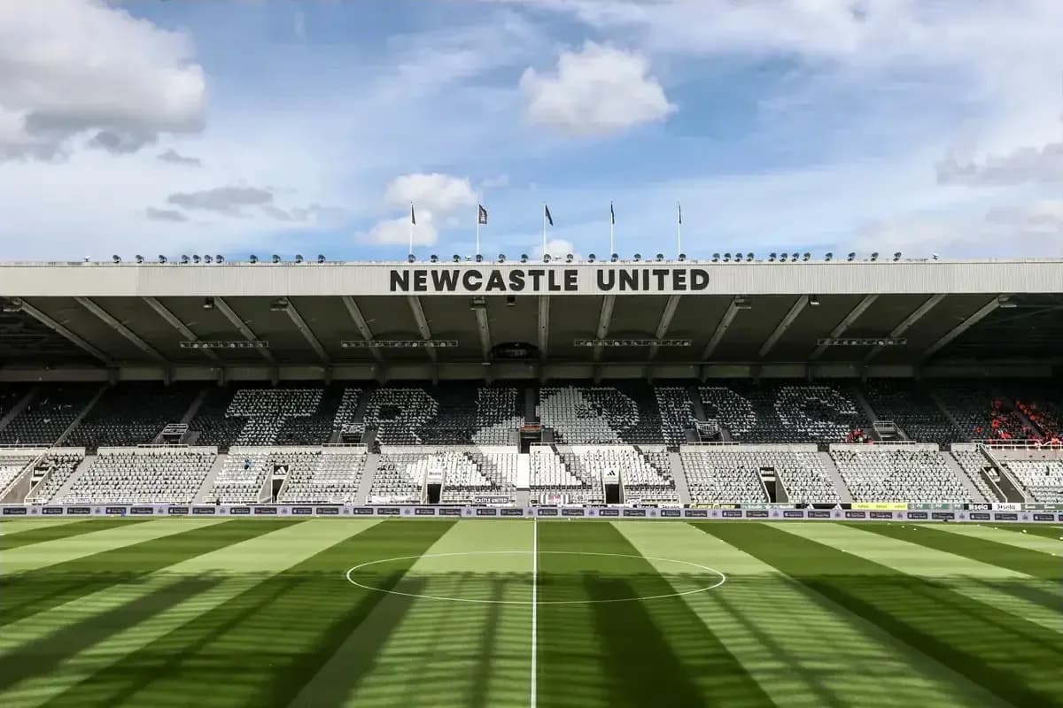 Newcastle United stadium with empty seating and pitch Newcastle United stadium with empty seating and pitch