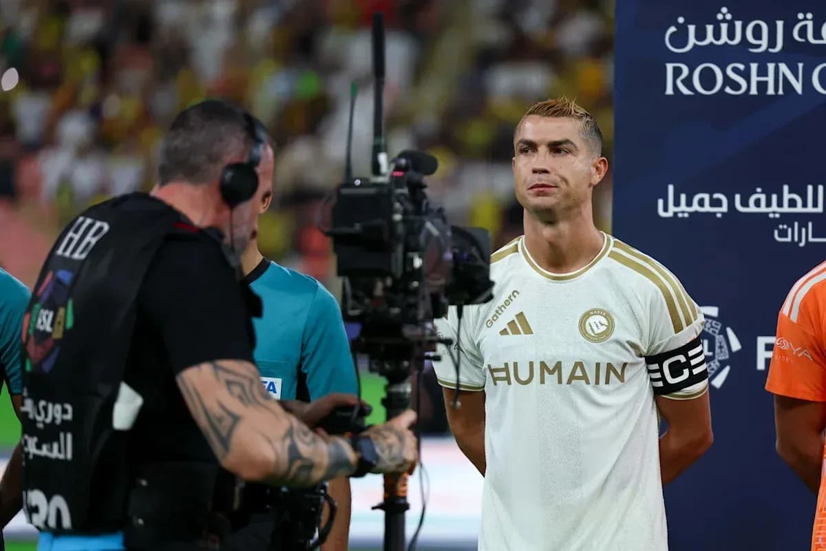 Cristiano Ronaldo standing before a match with camera crew Cristiano Ronaldo standing before a match with camera crew
