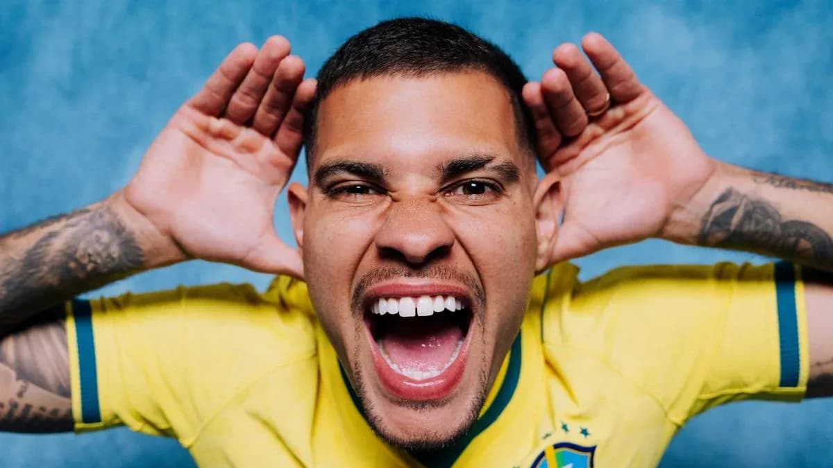 Player in Brazil jersey making a playful expression Player in Brazil jersey making a playful expression