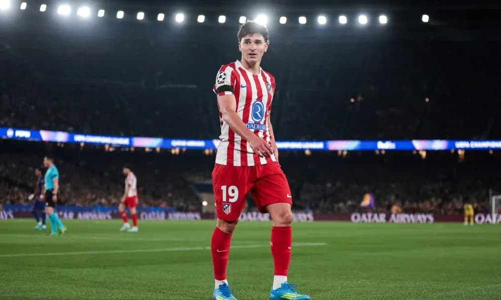 Atletico Madrid player on pitch during UEFA match Atletico Madrid player on pitch during UEFA match