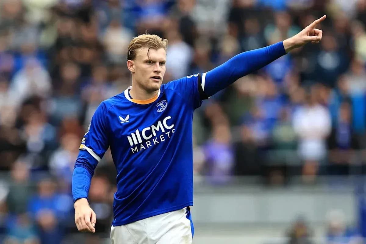 Player in blue jersey signaling during match Player in blue jersey signaling during match