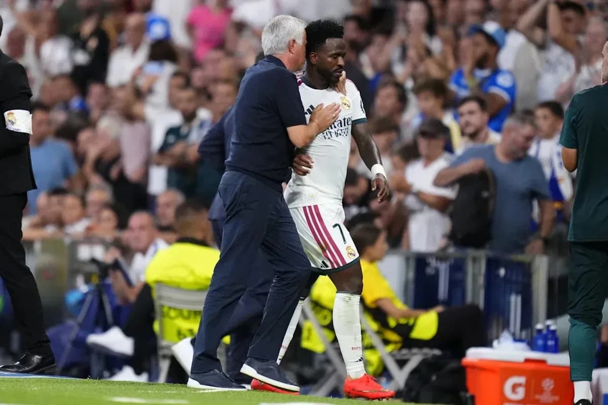 Coach speaking to player during match substitution Coach speaking to player during match substitution