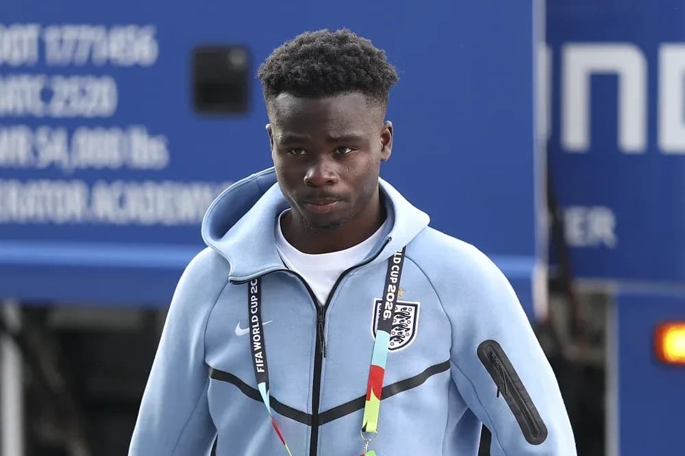 Player arriving at venue in team tracksuit Player arriving at venue in team tracksuit