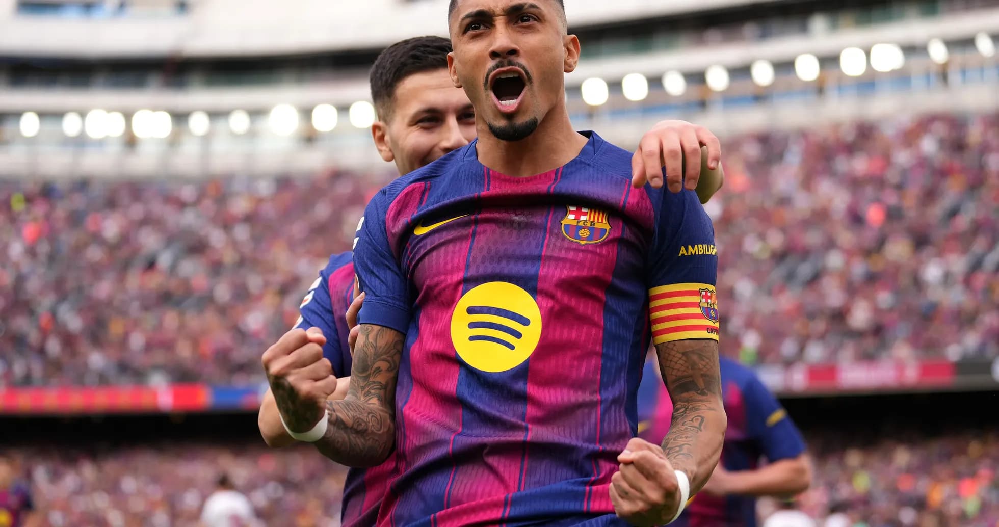 Barcelona player celebrating goal at La Liga match Barcelona player celebrating goal at La Liga match