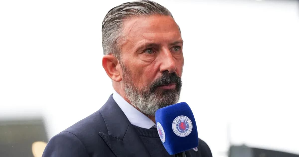 Man speaking into a microphone at event Man speaking into a microphone at event