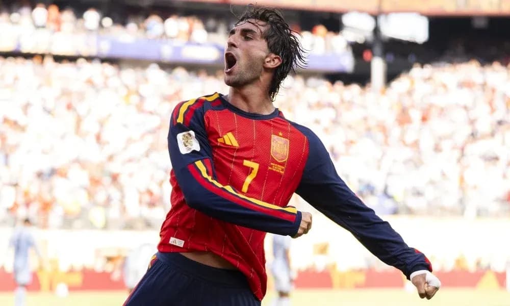 Player celebrating a goal in Spain national team jersey Player celebrating a goal in Spain national team jersey