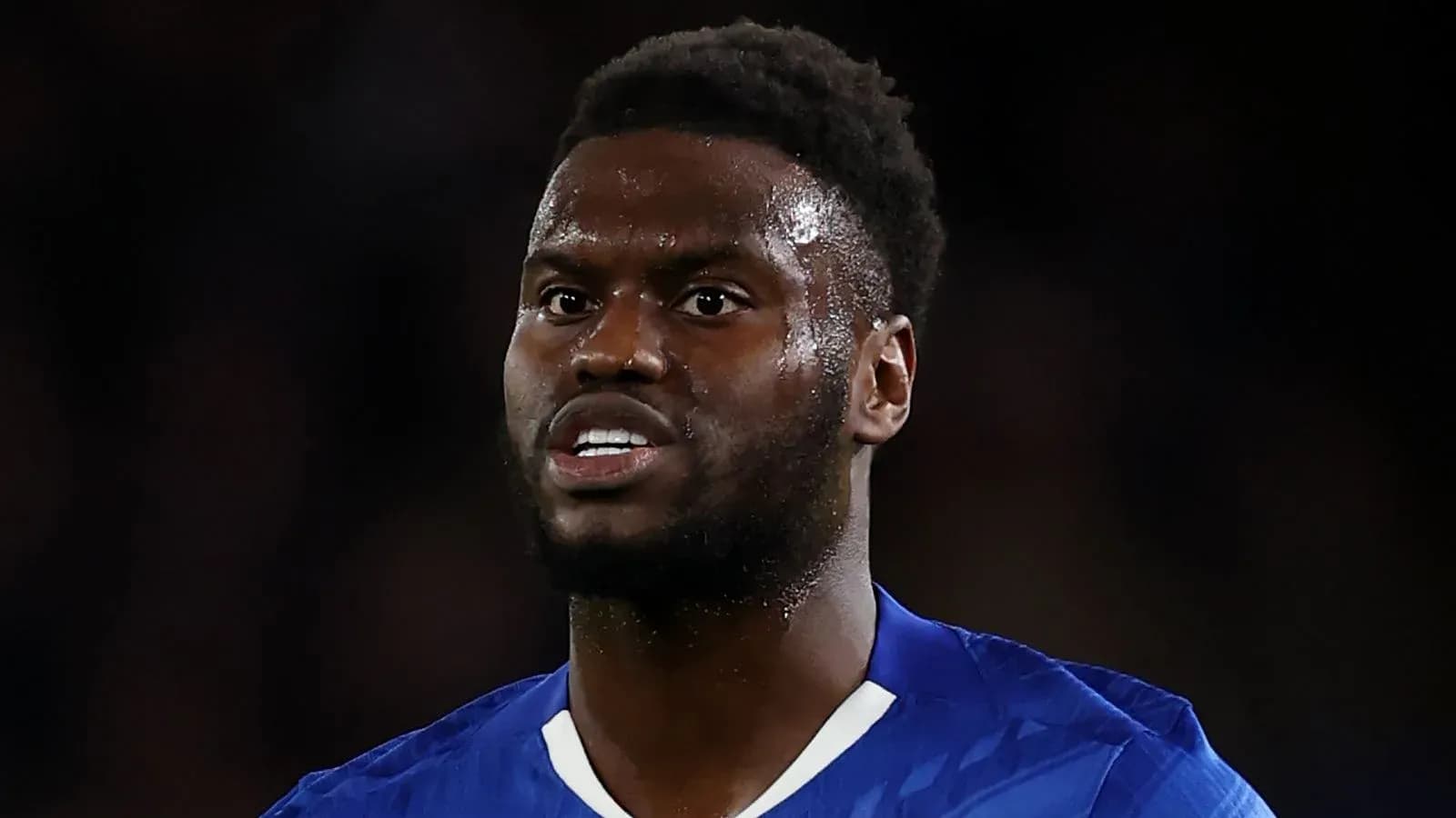 Player wearing blue kit during match action Player wearing blue kit during match action