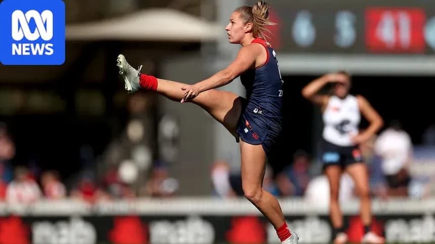 Player kicking the ball during a football match Player kicking the ball during a football match