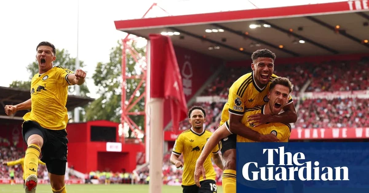 Players celebrating a goal during a football match Players celebrating a goal during a football match