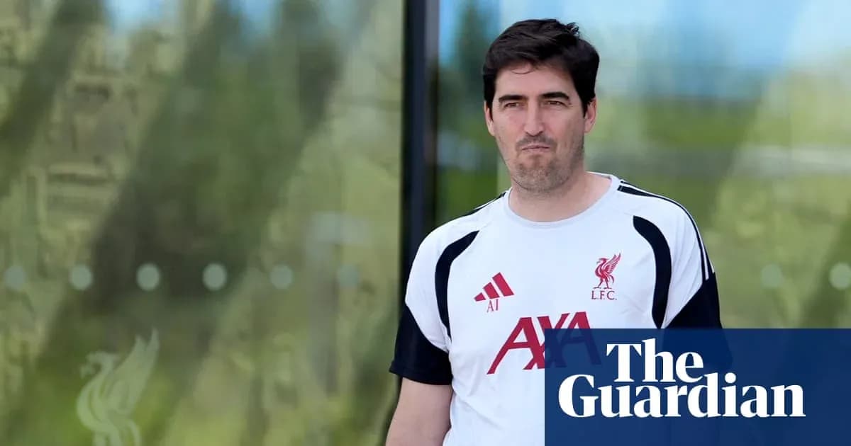 Coach walking outside Liverpool training facility Coach walking outside Liverpool training facility