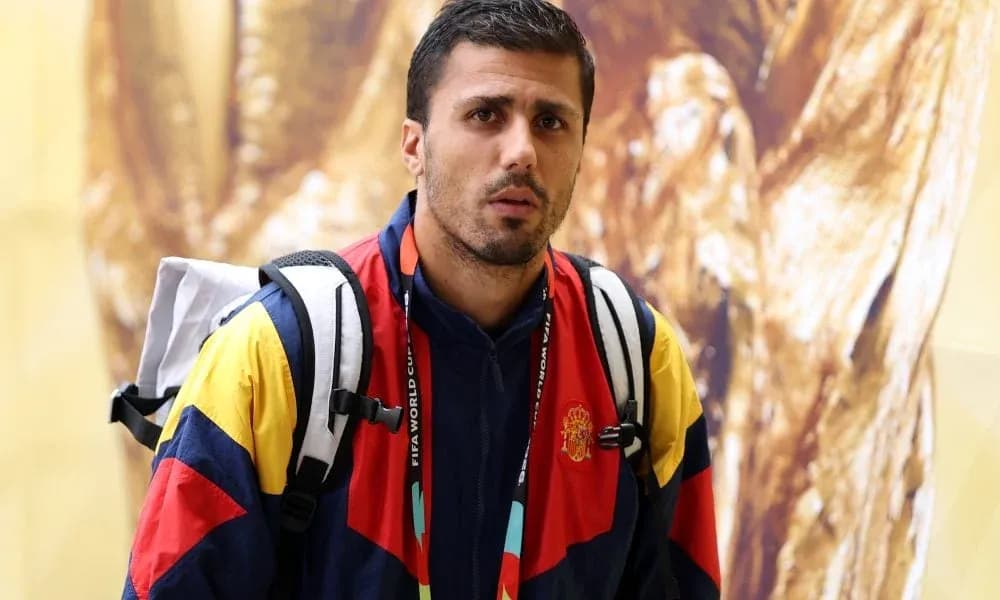 Athlete wearing team jacket and backpack indoors Athlete wearing team jacket and backpack indoors
