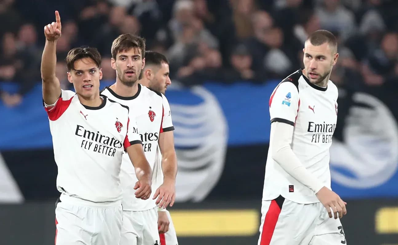AC Milan players celebrating during a match AC Milan players celebrating during a match