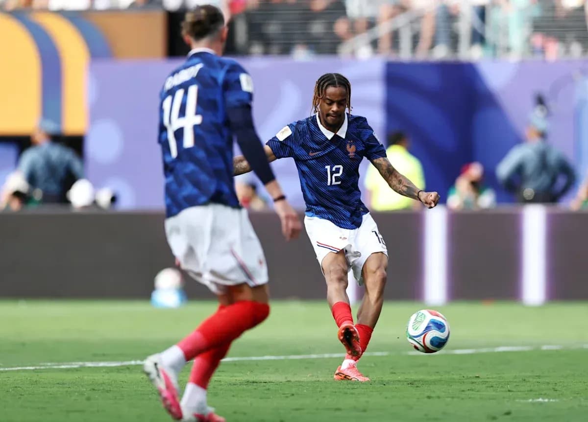 French player kicking the ball during match French player kicking the ball during match