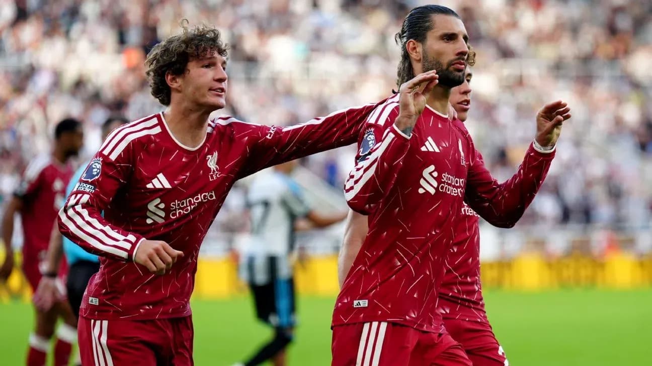 Liverpool players celebrating a goal during match Liverpool players celebrating a goal during match