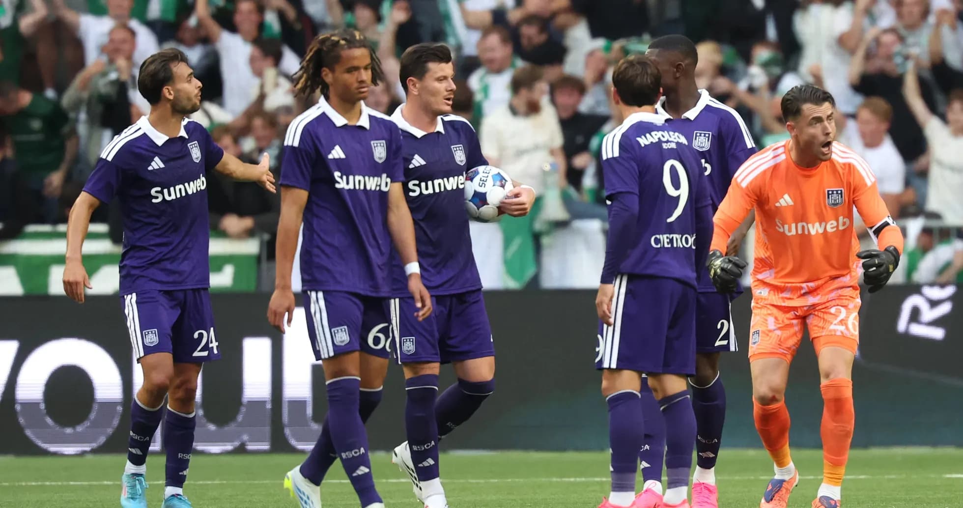 Anderlecht players celebrating during a match Anderlecht players celebrating during a match