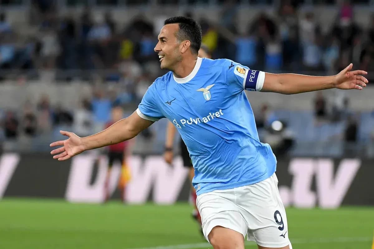 Lazio player celebrating a goal on the field Lazio player celebrating a goal on the field
