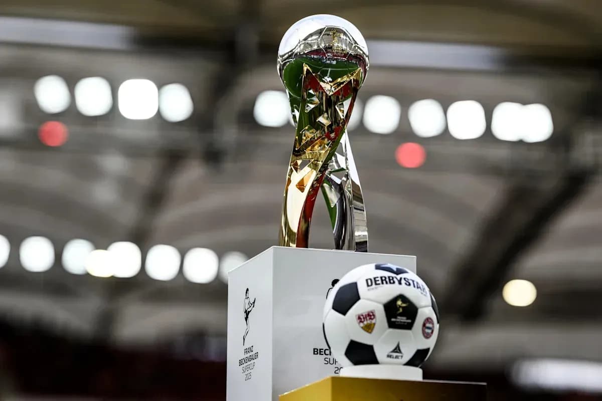 Franz Beckenbauer Supercup trophy with a football Franz Beckenbauer Supercup trophy with a football