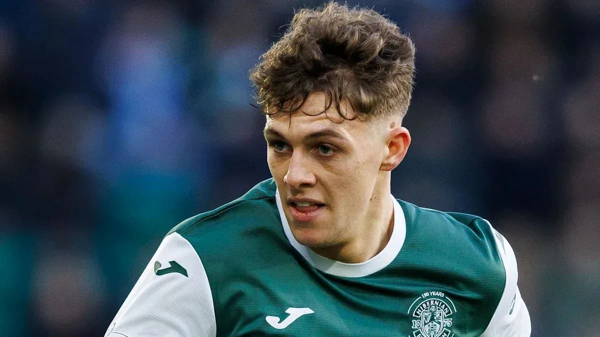 Player in Hibernian kit during match action Player in Hibernian kit during match action