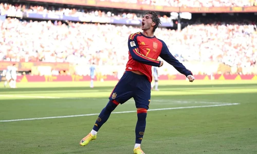 Player celebrating after scoring during a match Player celebrating after scoring during a match