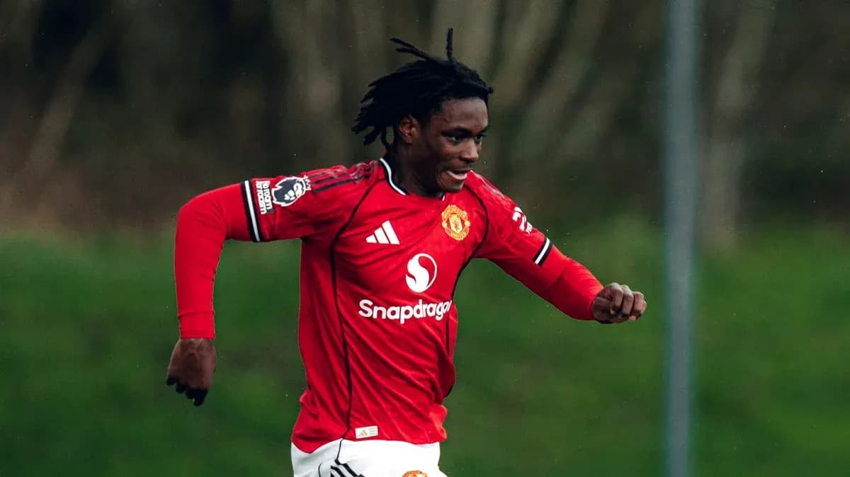 Player running in Manchester United red jersey Player running in Manchester United red jersey