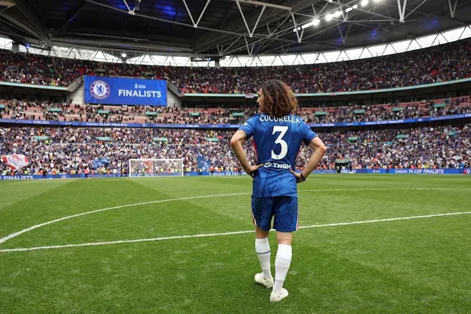 Player in Chelsea kit on pitch at Wembley Stadium Player in Chelsea kit on pitch at Wembley Stadium
