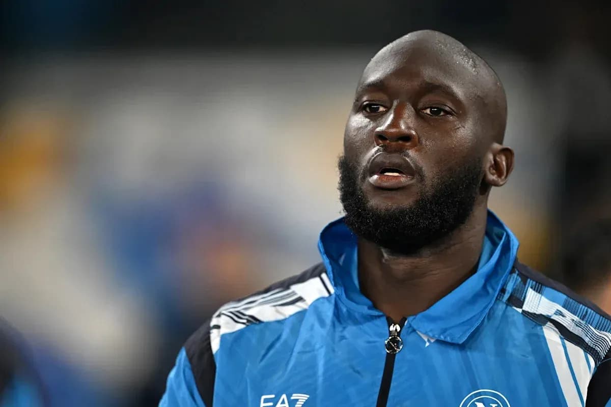 Player in blue training jacket before match Player in blue training jacket before match