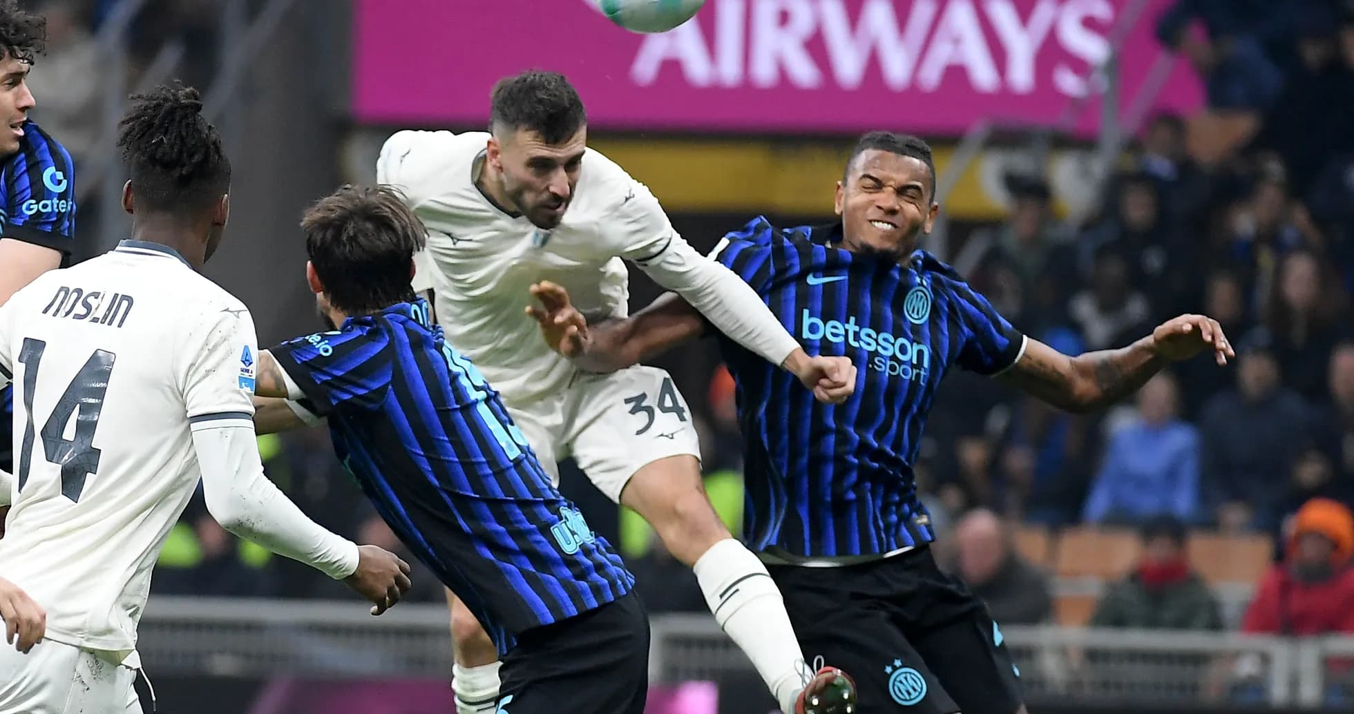 Players contesting a header during Lazio vs Inter match Players contesting a header during Lazio vs Inter match