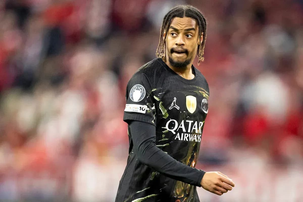 Player wearing PSG jersey on the pitch Player wearing PSG jersey on the pitch