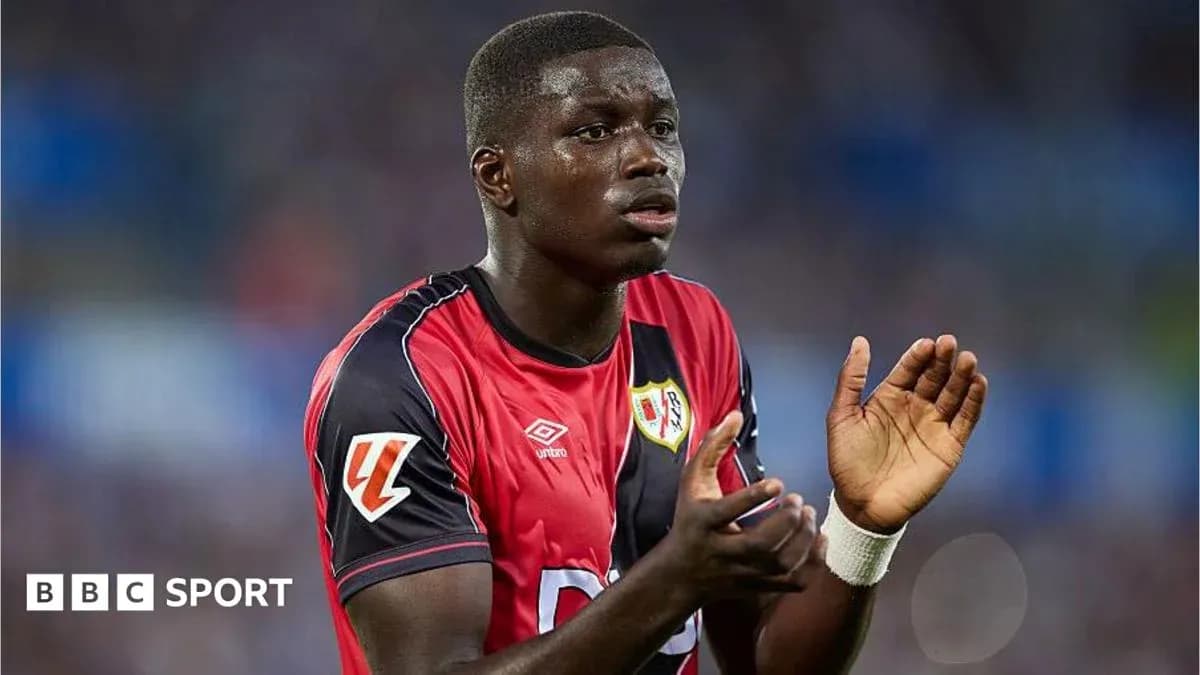 Player applauding during a football match Player applauding during a football match
