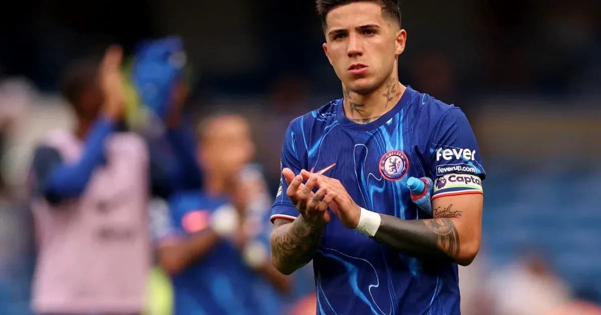 Player applauding fans in Chelsea home kit Player applauding fans in Chelsea home kit