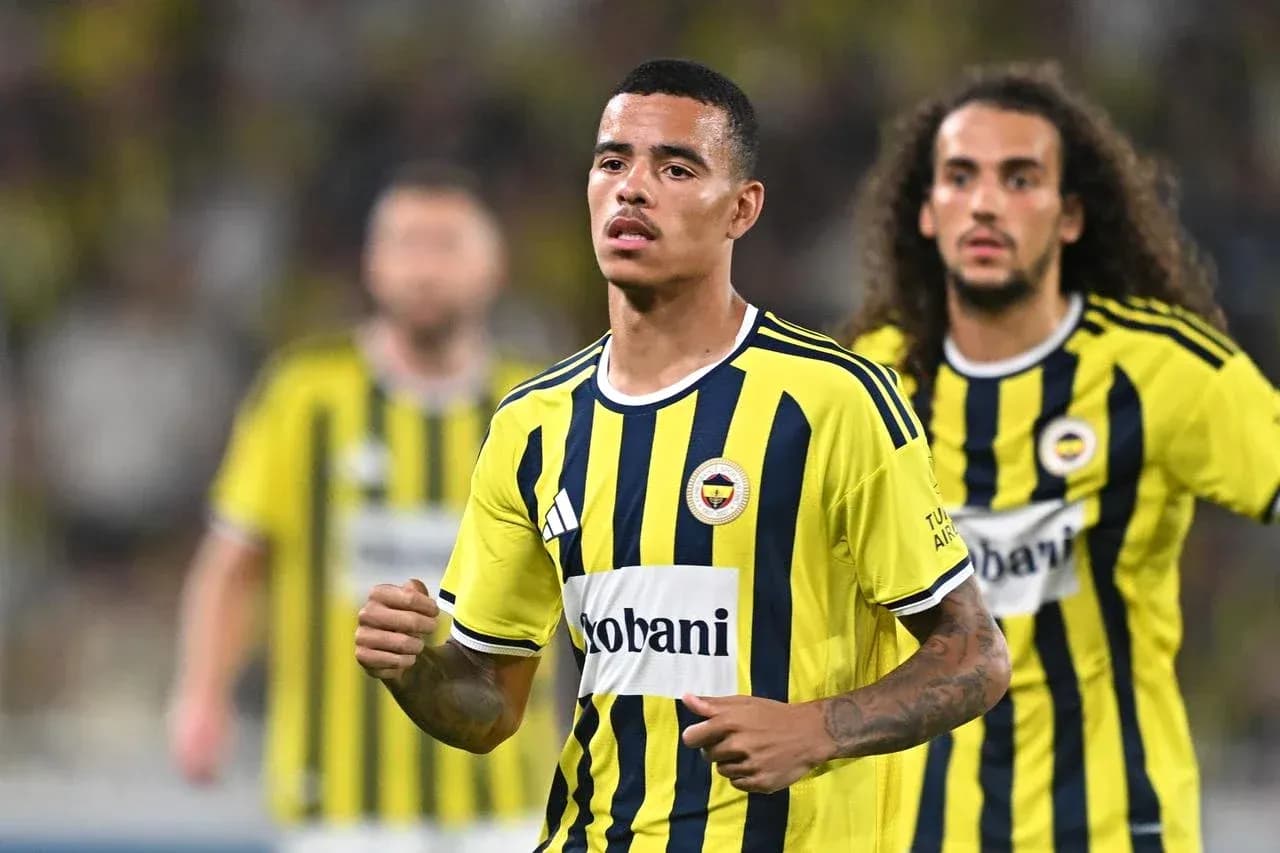 Fenerbahçe players celebrating during a match Fenerbahçe players celebrating during a match