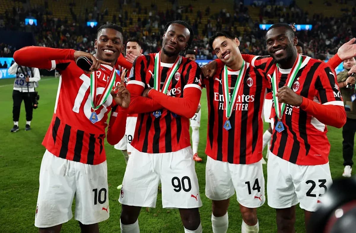 AC Milan players celebrating with medals after match AC Milan players celebrating with medals after match