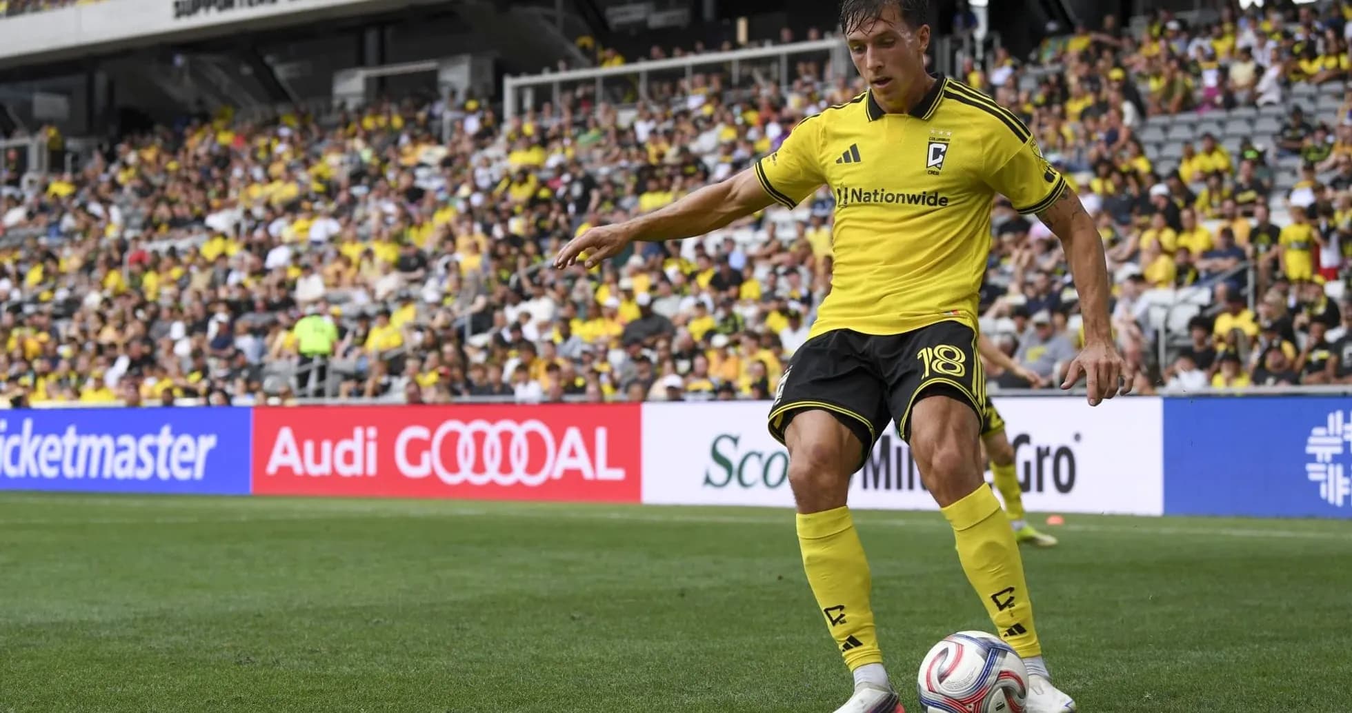 Columbus Crew player taking a corner kick Columbus Crew player taking a corner kick