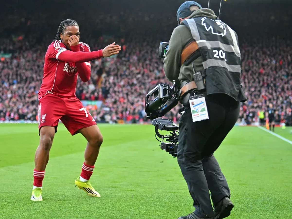 Liverpool player celebrating in front of photographer Liverpool player celebrating in front of photographer