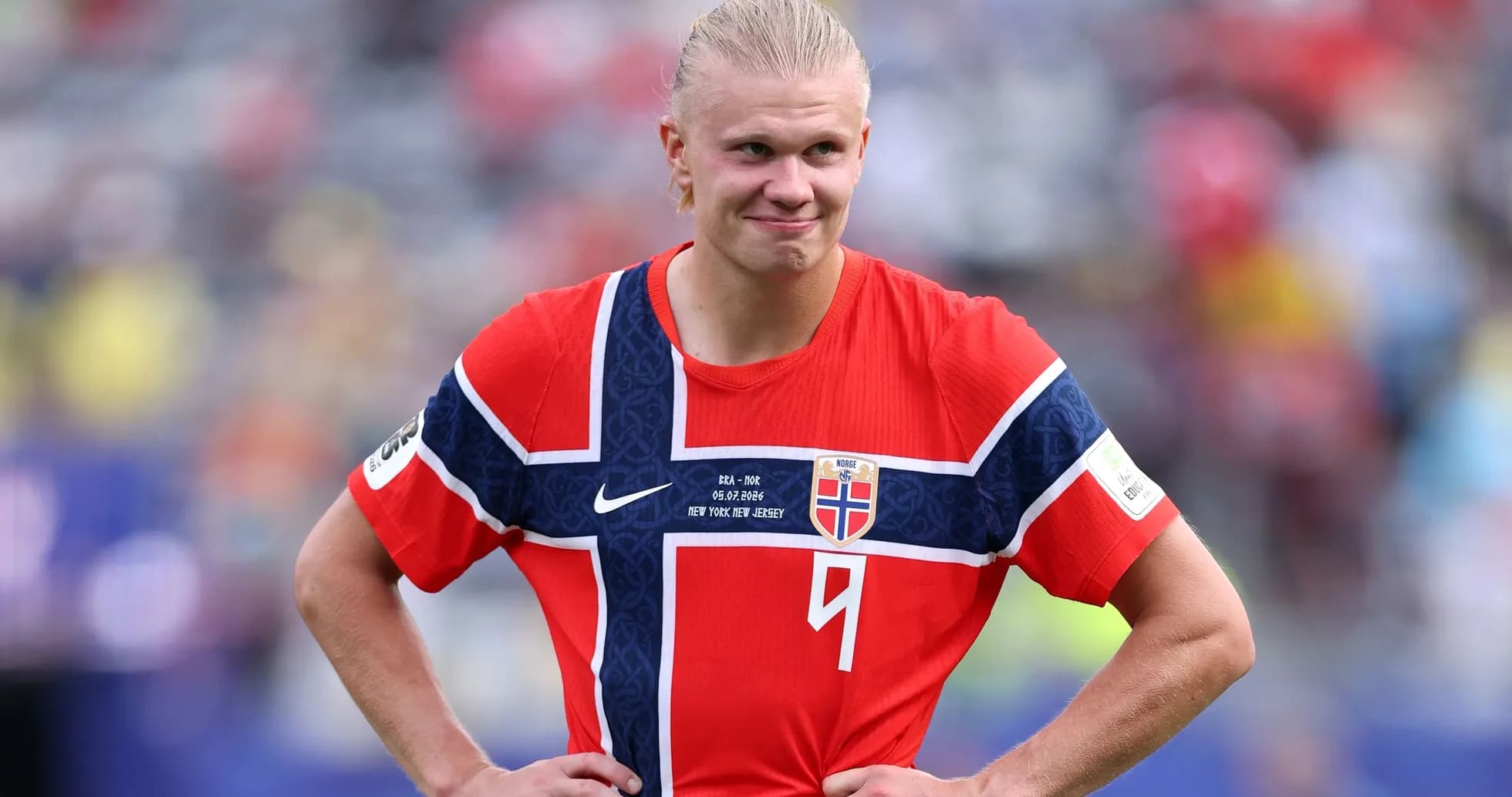 Norwegian player wearing national team jersey on field Norwegian player wearing national team jersey on field