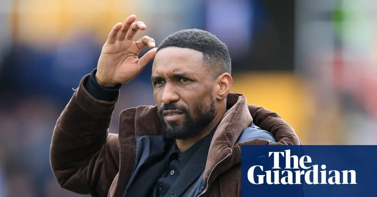Man gesturing during a sporting event Man gesturing during a sporting event