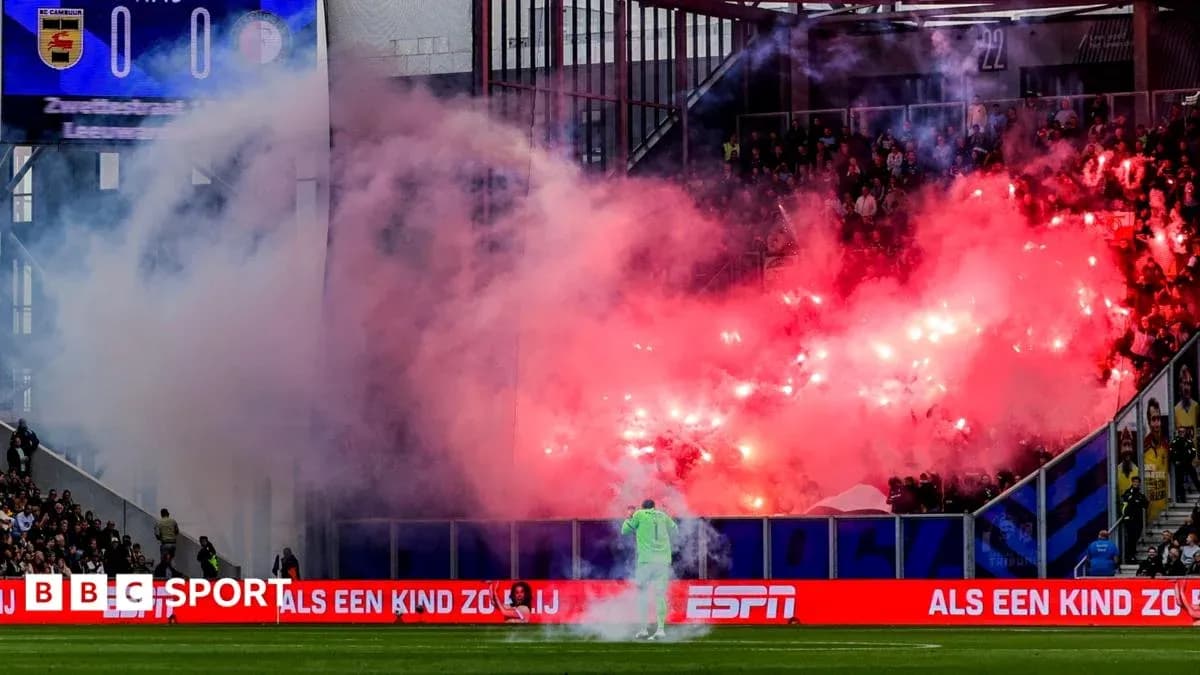 Fans creating smoke with flares during match Fans creating smoke with flares during match